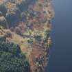 Oblique aerial view of Portmark farmstead and S end of tracked target range, looking SSW.