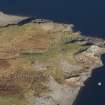 Oblique aerial view of military remains, looking NNE.