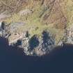 Oblique aerial view of military remains, looking W.