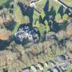 Oblique aerial view of Kirkhill House and Kirkhill Castle, looking NNW.