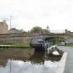 General view of canal dredger in front of Bridge No 1, Union Canal, Viewforth, Edinburgh, from the east