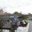 General view of canal dredger in front of Bridge No 1, Union Canal, Viewforth, Edinburgh, from the east