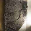 View of Pictish symbol stone. Peripheral lighting.