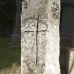 View of pillar with incised cross. Peripheral light.