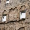 Detail of second floor windows at Working Men's Home, 70-76 Grove Street, Edinburgh.