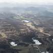 General oblique aerial view across Nuide Moss towards Phoines and Etteridge, with the Dunkeld to Inverness Military Road at lower right crossing Milton Burn at Drochaid Balbh Bhardain, looking SW.