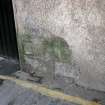 Detail of stonework below render in pend at Dunbar's Close, 137 Canongate, Edinburgh.