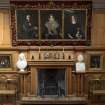 1st floor, cedar room, view of fireplace with portraits above of Mrs Fraser flanked by Mr and Mrs Allan Fraser