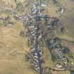 Oblique aerial view of Leadhills village and cultivation remains, looking NNE.