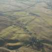 Oblique aerial view of Leadhills Golf Course, the mining remains and the field systems, looking SW.