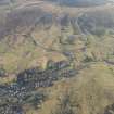 General oblique aerial view of Leadhills village, the mining remains and the golf course, looking E.