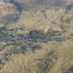 General oblique aerial view of Leadhills village, the mining remains and the golf course, looking E.