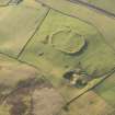 Oblique aerial view of the settlement and quarry, looking SW.