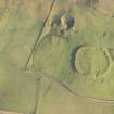 Oblique aerial view of the settlement and quarry, looking E.