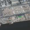 Oblique aerial view of the redevelopment of the Dundee waterfront between Craig Harbour and the Tay Road Bridge, looking NNW.