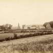 Distant view of Fenwick Parish Church and village.

