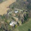 Oblique aerial view of Wyseby House, walled garden, stables and dovecot, looking NNW.