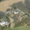 Oblique aerial view of Wyseby House, walled garden, stables and dovecot, looking NW.