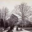 View of garden with two ladies walking in the grounds of St Germains House.