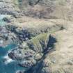 Oblique aerial view of Dun nan Gall on Tiree, looking E.