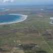 General oblique aerial view of Tiree, centred on Vaul golf course, looking W.