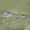 Oblique aerial view of cottages at The Green on the Isle of Tiree, looking S.