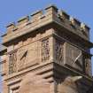 View of sundial at top of Hospitalfield House tower, Arbroath, showing north east and south east faces