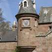 Entrance to north west courtyard, detail of clock turret