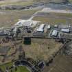 Oblique aerial view of Edinburgh Airport and Air Freight Centre, looking SSW.