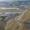 Oblique aerial view of Edinburgh Airport, looking SSW.