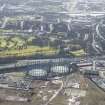 Oblique aerial view of Provan Gasworks including gasholders, looking SE.