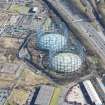 Oblique aerial view of Provan Gasworks including gasholders, looking E.
