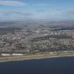 General oblique aerial view of Dundee centred on Balgay Park and Airport, looking N.