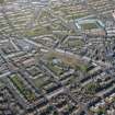 Oblique aerial view of The Hilltown, Mortimer Street, the churches, Dens Park and Tannadice Park, looking NE.