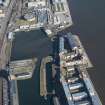 Oblique aerial view of Camperdown Dock, Victoria Dock and East Graving Dock, looking ENE.
