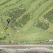 Oblique aerial view of Invergordon golf course, looking N.