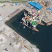 Oblique aerial view of Invergordon oil rig service base, looking NW.