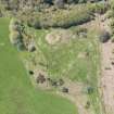 Oblique aerial view of Scotsburn House dun and chambered cairn, looking W.