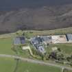 Oblique aerial view of the Glenmorangie Distillery, looking NE.