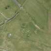 Oblique aerial view of Tain airfield dispersal site, looking S.