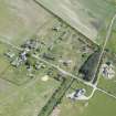 Oblique aerial view of Fearn Airfield accomodation camp, looking ESE.