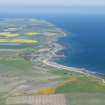 General oblique aerial view centred on Balintore with Tarbat Ness beyond, looking NE.