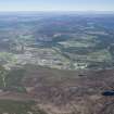 General oblique aerial view centred on Aviemore, looking E.