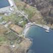 Oblique aerial view of Kinlochbervie North Pier and harbour, looking S.