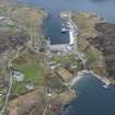 Oblique aerial view of Kinlochbervie North Pier and harbour, looking SSE.