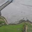 Oblique aerial view of enclosures, possible fish traps, at Findon on the Cromarty Firth, looking WNW.