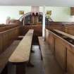 Durisdeer Parish Church. South Aisle View of communion box pews converted into communion tables.