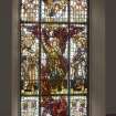 Ist floor. View of stained glass window depicting St. Raphael, St. Michael and St. Gabriel casting out the dragon.