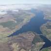 General oblique aerial view of Loch Shin centred on Lairg power station and dam, looking NW.