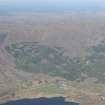 General oblique aerial view of Achfary with Strath Stack beyond, looking WSW.